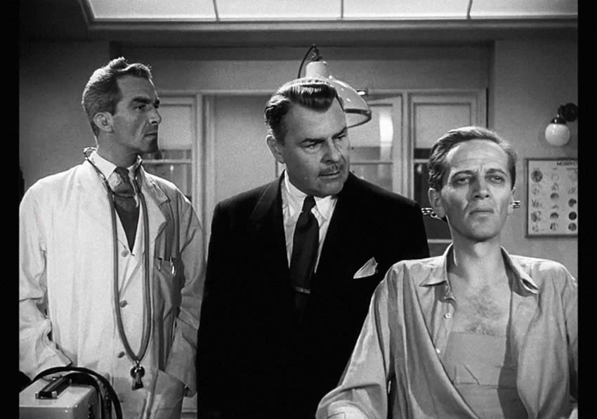 Three men in a laboratory